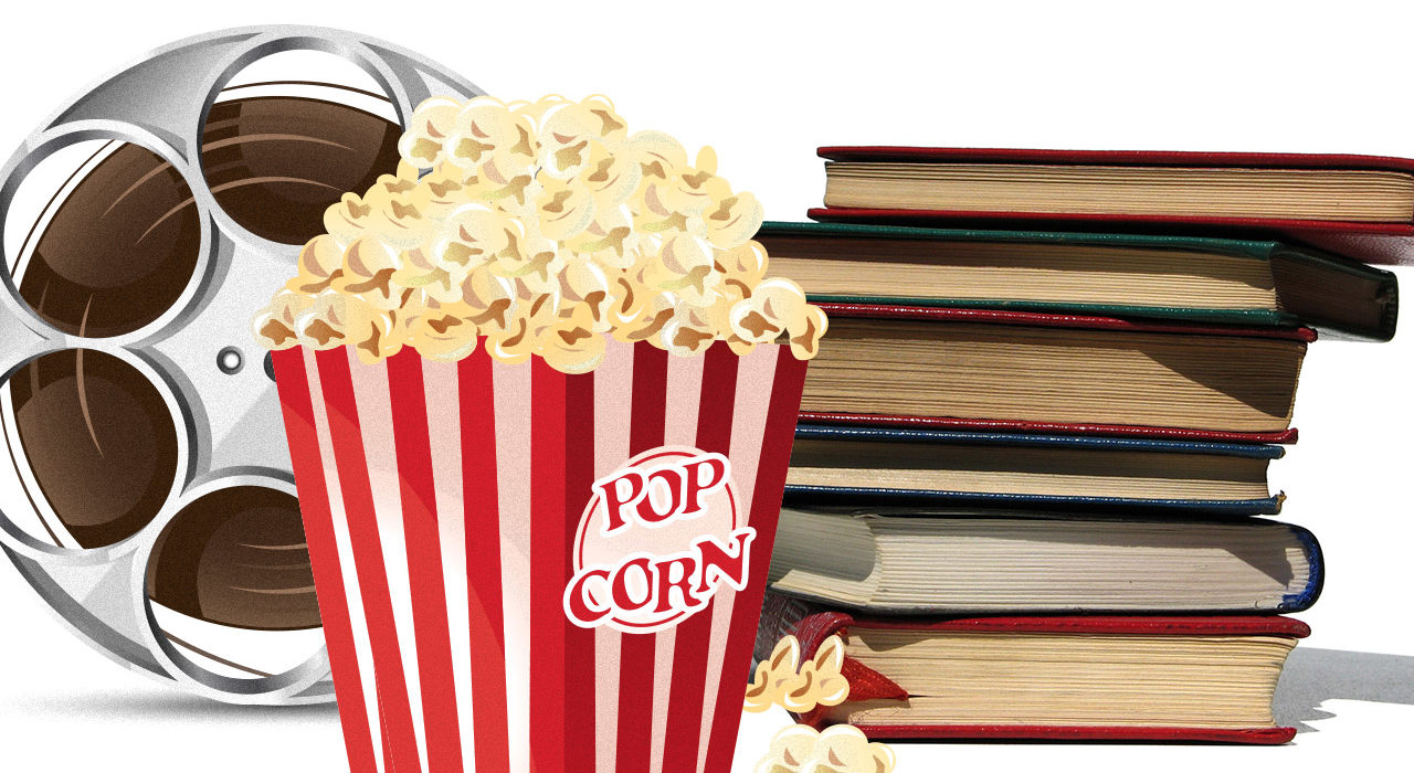 Image of movie reel and stack of books behind a box of popcorn.