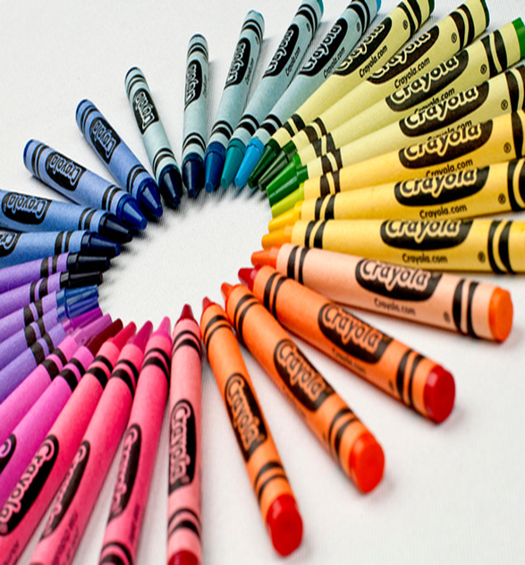 Image of different colored crayons arranged in a circle.
