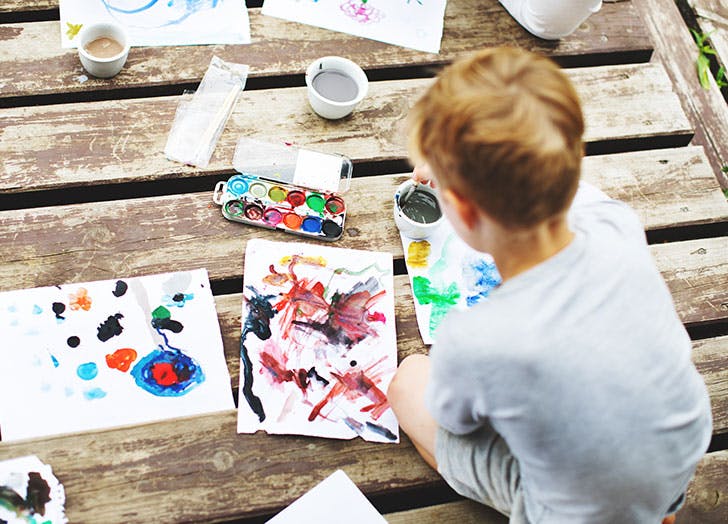 Image of child doing a craft