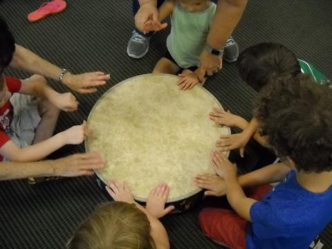 Children drumming.
