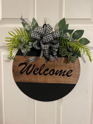wooden welcome sign