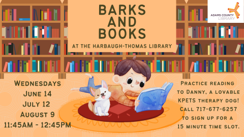 boy in library reading to dog