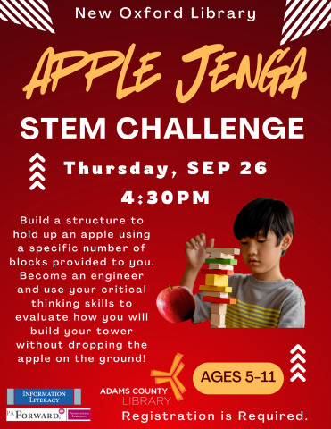 boy with Jenga blocks and an apple