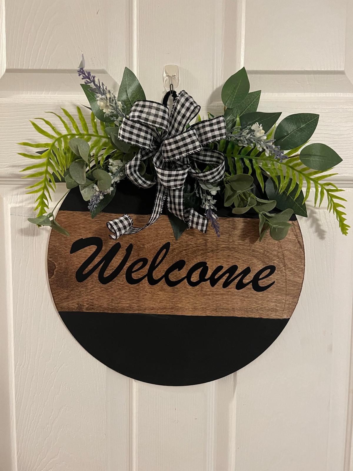 wooden welcome sign